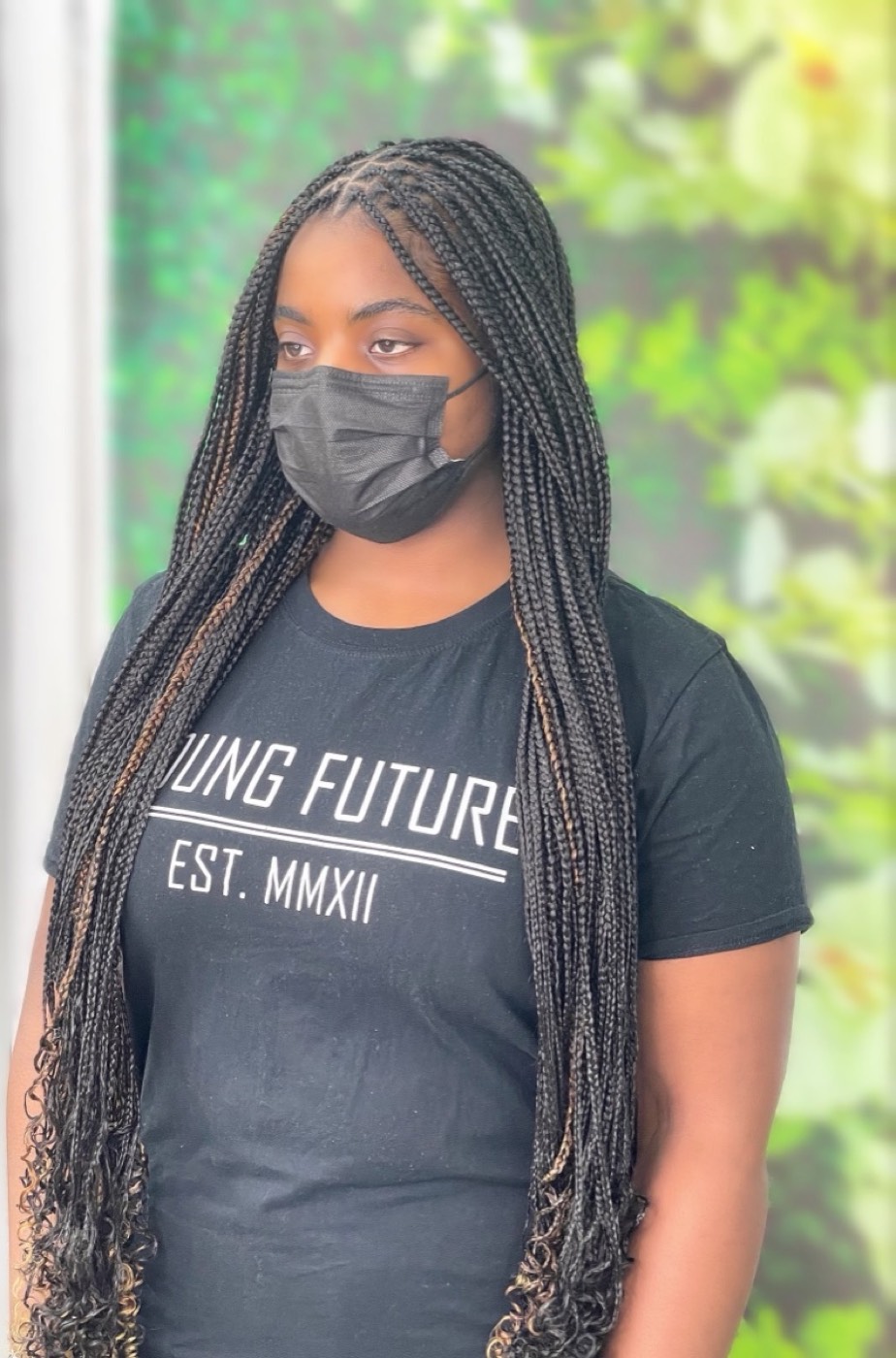 Long boho knotless braids with soft curly ends